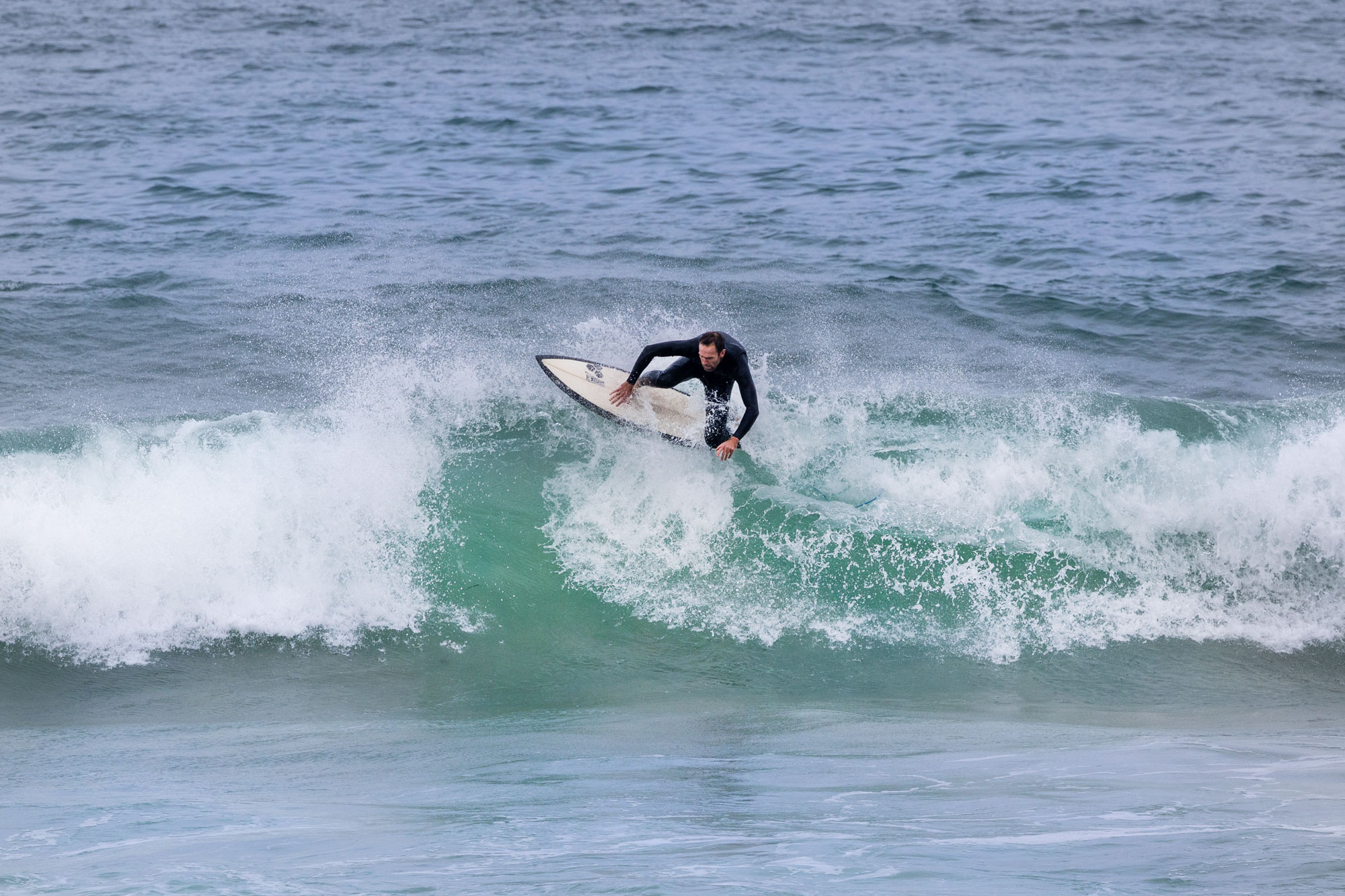 Surfer checking wind conditions at dawn — Moroccan Atlantic coast