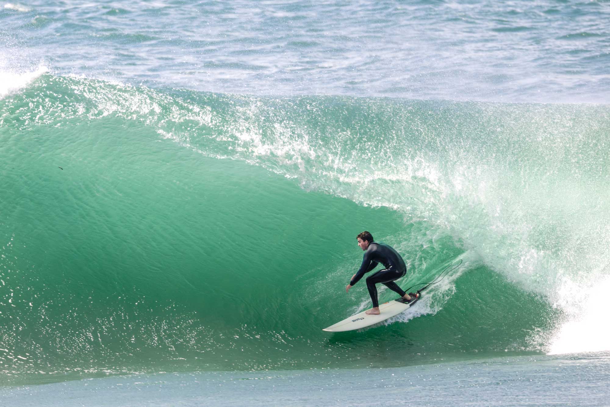 Point break lighting up on a clean NW swell — Morocco